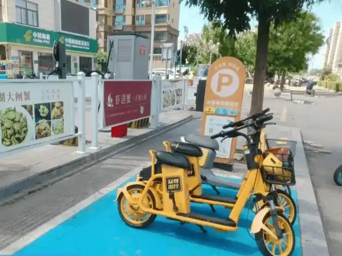 成武县综合行政执法局:共享单车有了"家" 用后把它送回"家"