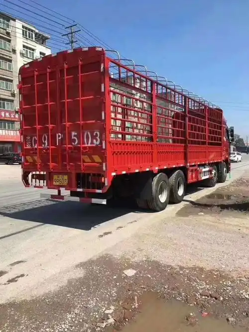 出售二手解放前四后八9米6高栏载货车 国五 460马力一年车 8*4