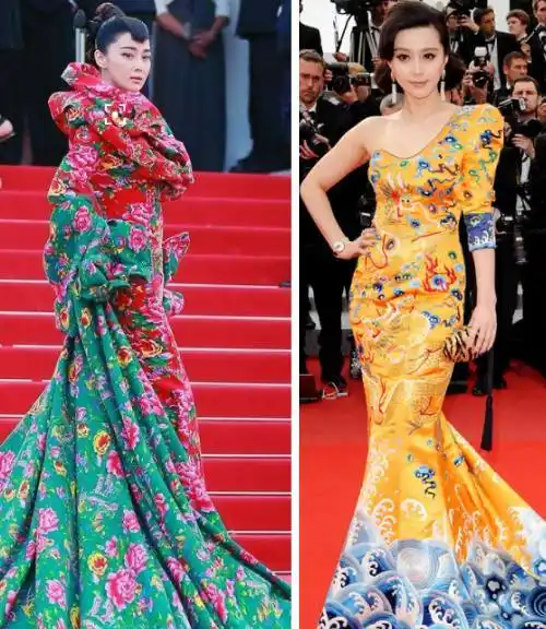 最著名的还要属范冰冰和张馨予的红毯,几乎范冰冰的"龙袍装"一举拿下
