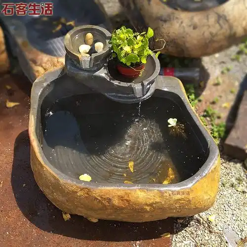 原石雕刻一体流水鱼缸艺术石头水池入户花园镇石雕