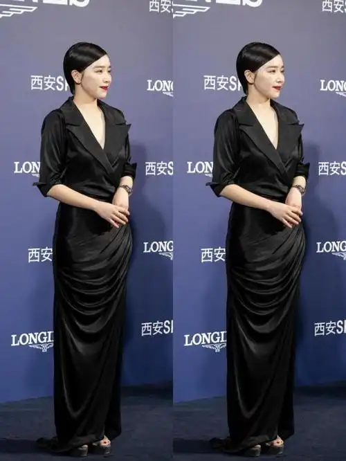 别看阚清子个子不高,但气场真挺强的,一袭黑色衬衫裙似女强人