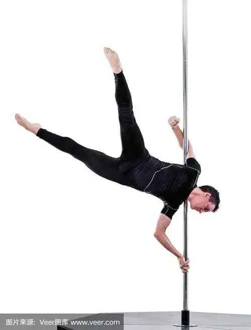 男子表演钢管舞.工作室拍摄,白色背景,孤立