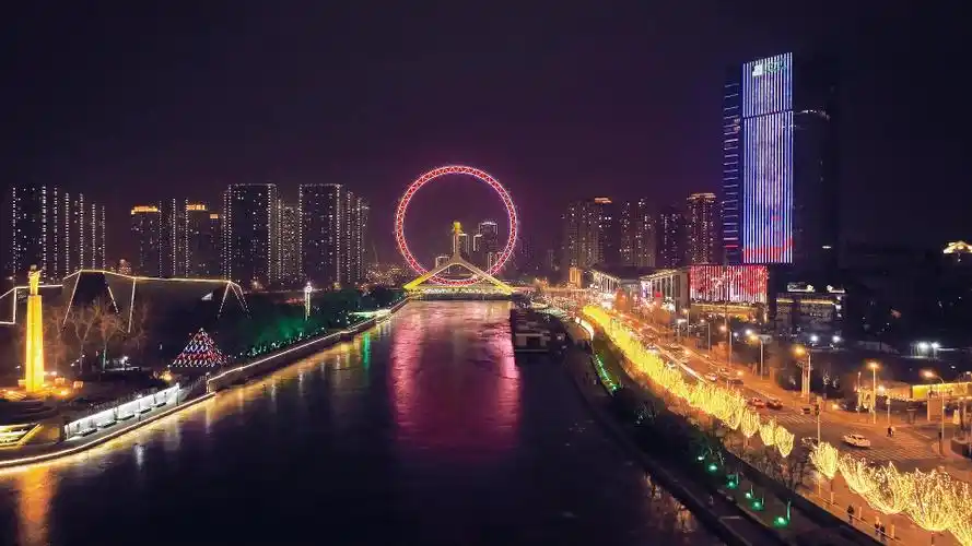 航拍天津之眼和金刚桥夜景海河两岸流光溢彩年味浓浓