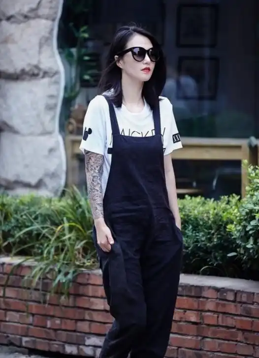 "摇滚女王"谭维维的6张美照,帅气的花臂格外抢眼,真有范