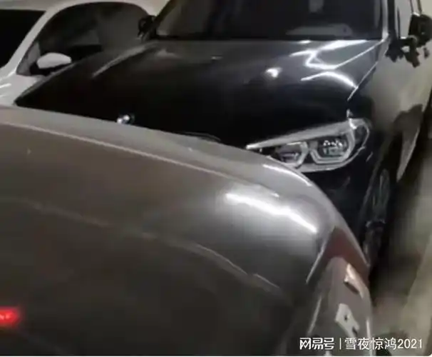 宝马女抢占他人车位被主人用路虎堵了112天