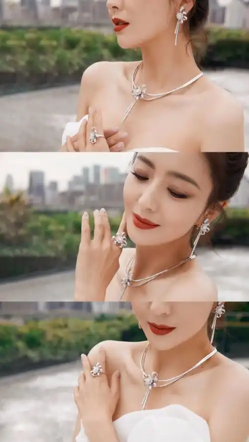 38岁佟丽娅穿白色抹胸裙秀香肩气质优雅