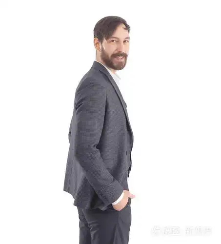 侧面视图.商业西装的商人.在白色背景上被隔离