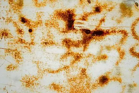 旧金属墙纹理背景与划痕和裂缝照片