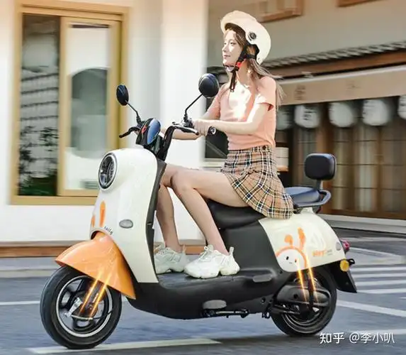 台铃萌咖果冻橙电动车