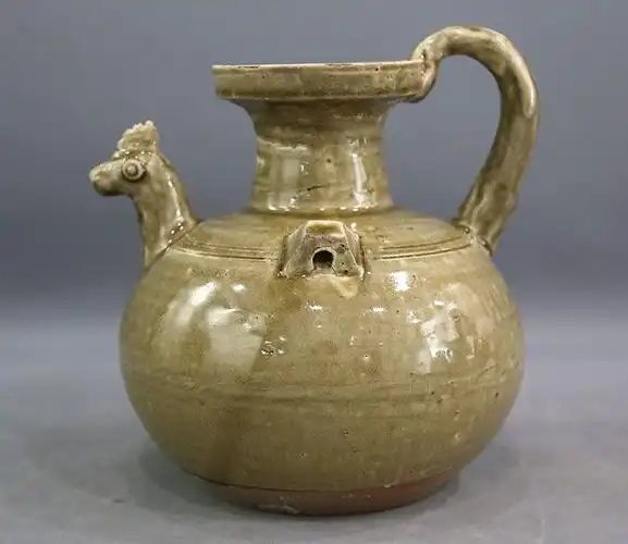 青釉覆莲鸡首壶