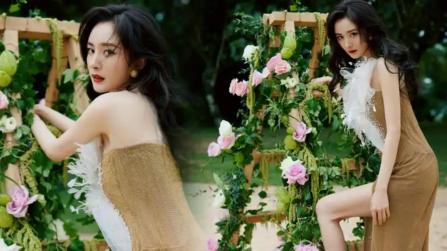 杨幂户外沙滩玫瑰大片曝光,高开衩长裙秀美腿,女人味十足