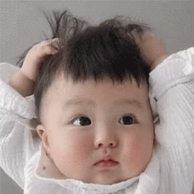 超可爱的丸子妹抓头发表情包