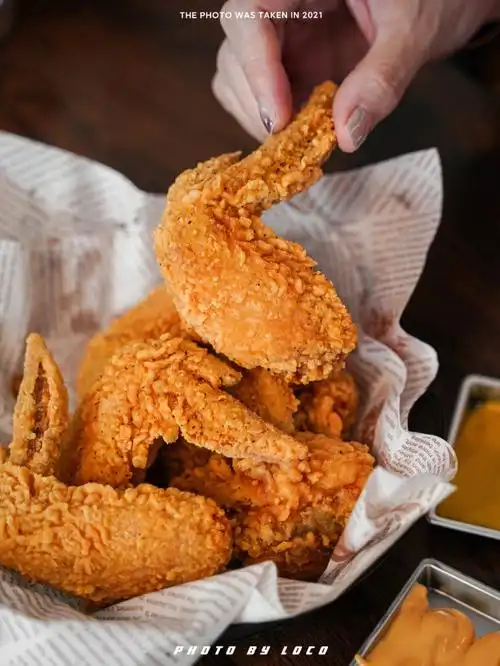 凭1只4块的炸鸡翅在南澳岛开店20年