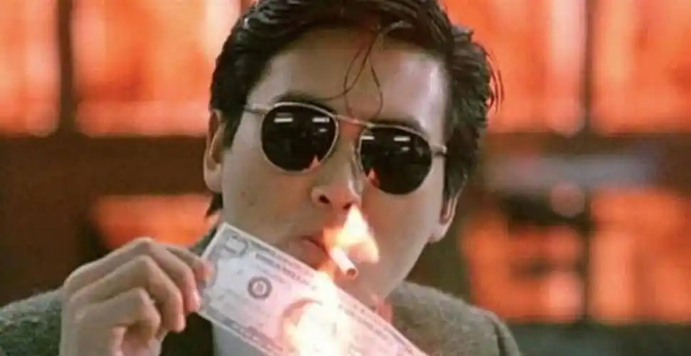 发哥在《赌神》里塑造的高进痞帅痞帅的样子,几乎风靡了整整一个时代.