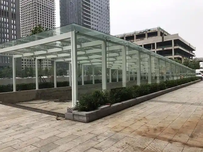 玻璃雨棚 - 天津卷帘门_伸缩门_感应门_钢制防火门_车棚_玻璃雨棚