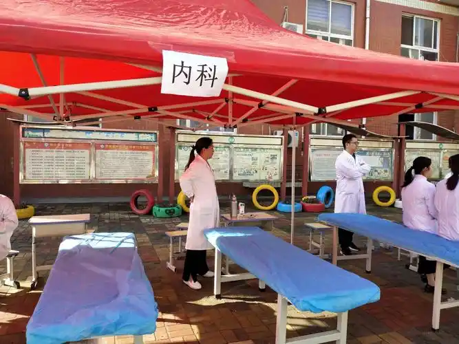 关注健康,关爱生命〕——记新郑市龙湖镇荆垌完全小学2019学生体检