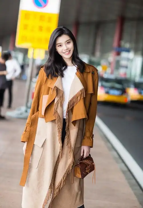 奚梦瑶帅气风衣街拍写真图片[3/6]_明星_美桌网