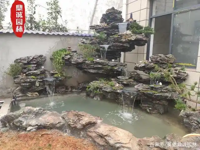 英石假山流水制作 园林庭院造景英石假山景观图片