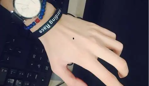 手背上长痣代表什么命运 男人右手背上有痣代表什么-善吉算命网