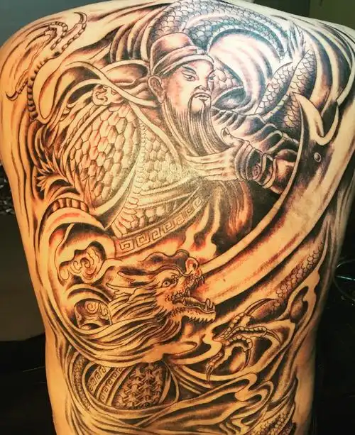 背部的帅气关公刺青tag标签:关公彩绘满背龙满背霸气关公和龙纹身tag