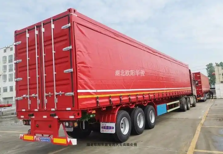 湖北拉啤酒饮料篷布侧帘集装箱半挂车多少钱