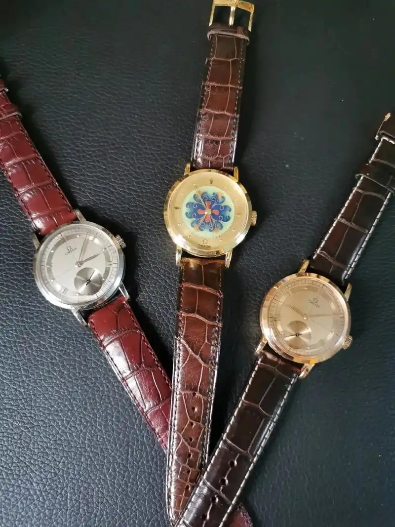 照着海报图册摆拍欧米茄1894百年纪念限量款