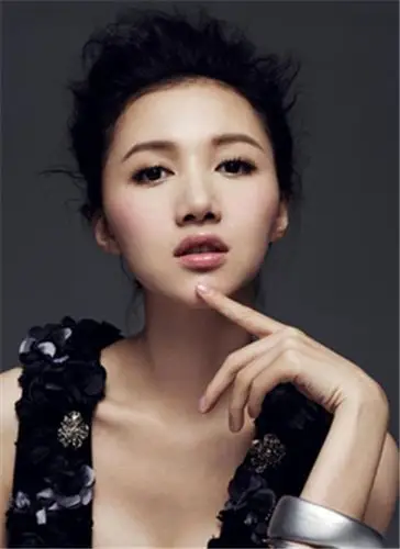 【图】李健妻子孟小蓓照片首曝光 北京演唱会深情告白小贝壳