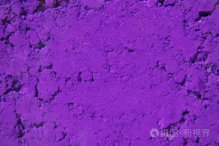 紫色紫色粉末背景. 印度霍利节的鲜艳颜色.