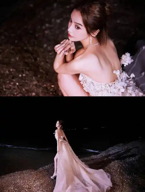 在海边礁石上凹造型,也太撩人美艳动人了吧.