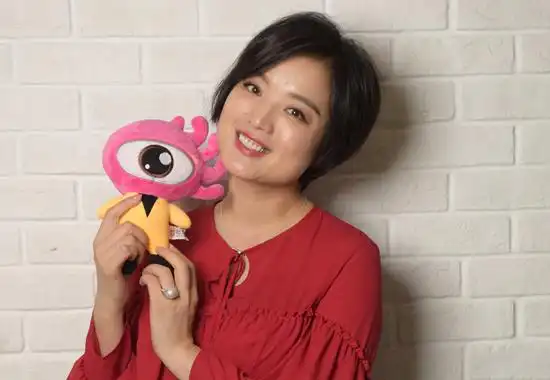 独家专访歌唱家白雪:儿子让我骄傲 13岁1米81