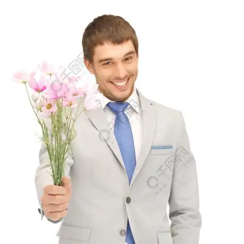 英俊的男人,用手中的花的图片