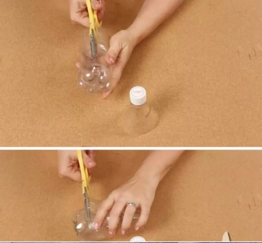 首先把矿泉水瓶上面的圆锥部分剪下来美工刀,胶带,细彩带1个矿泉水瓶