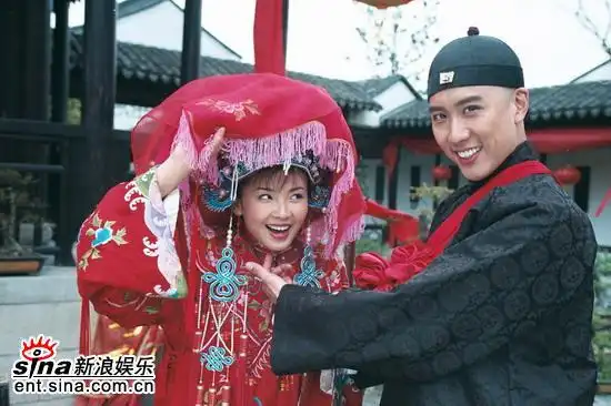 陈司翰和"新婚妻子"刘涛点击此处查看全部娱乐图片陈司翰和男装的刘涛