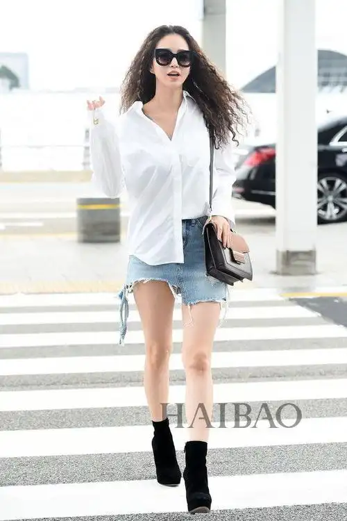 韩艺瑟2016年9月4日韩国仁川机场街拍:背decke手袋前往维也纳