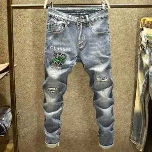 潮牌破洞补丁牛仔裤男修身弹力小脚裤高街刺绣老虎图案显瘦男裤子