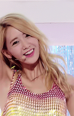 美女gif笑容gif性感gif歪头gif黄头发gif