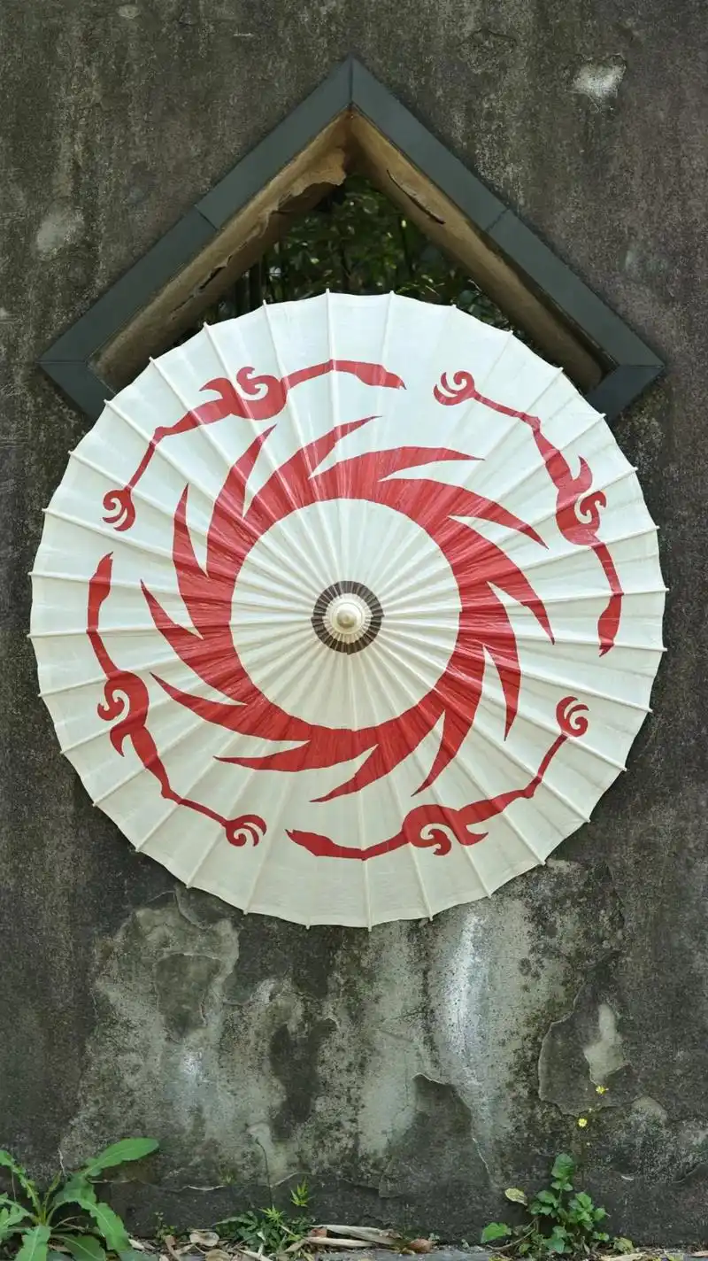 金乌图腾·油纸伞.太阳神鸟图案是中国文化遗产标志线条简练流 - 抖音