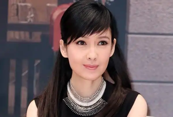 周慧敏为什么不生孩子 周慧敏为什么不要孩子内幕揭秘