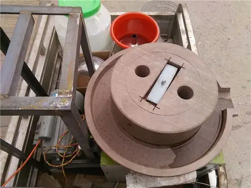 鼎达专业打造电动石磨砂岩石材电动石磨