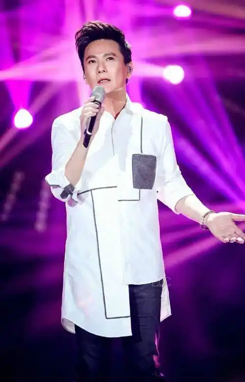 歌手张信哲时尚经典照片合集