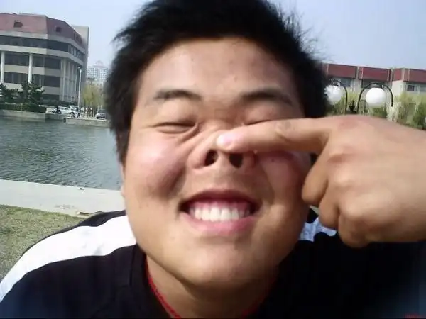 求一张丑男的照片,我要上传游戏真人秀的.越丑越好.