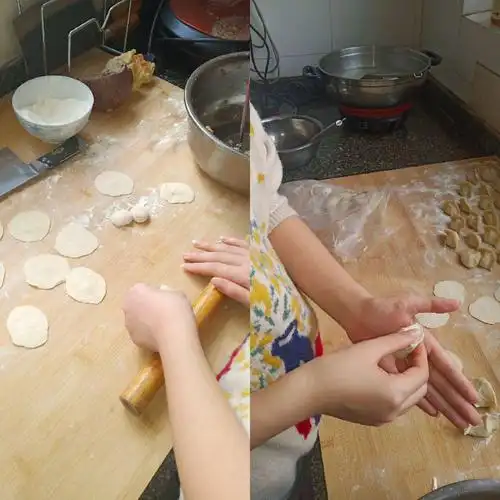 过年包饺子,饺子像一个金元宝,象征来年,财运亨通,也象征着一家扰团