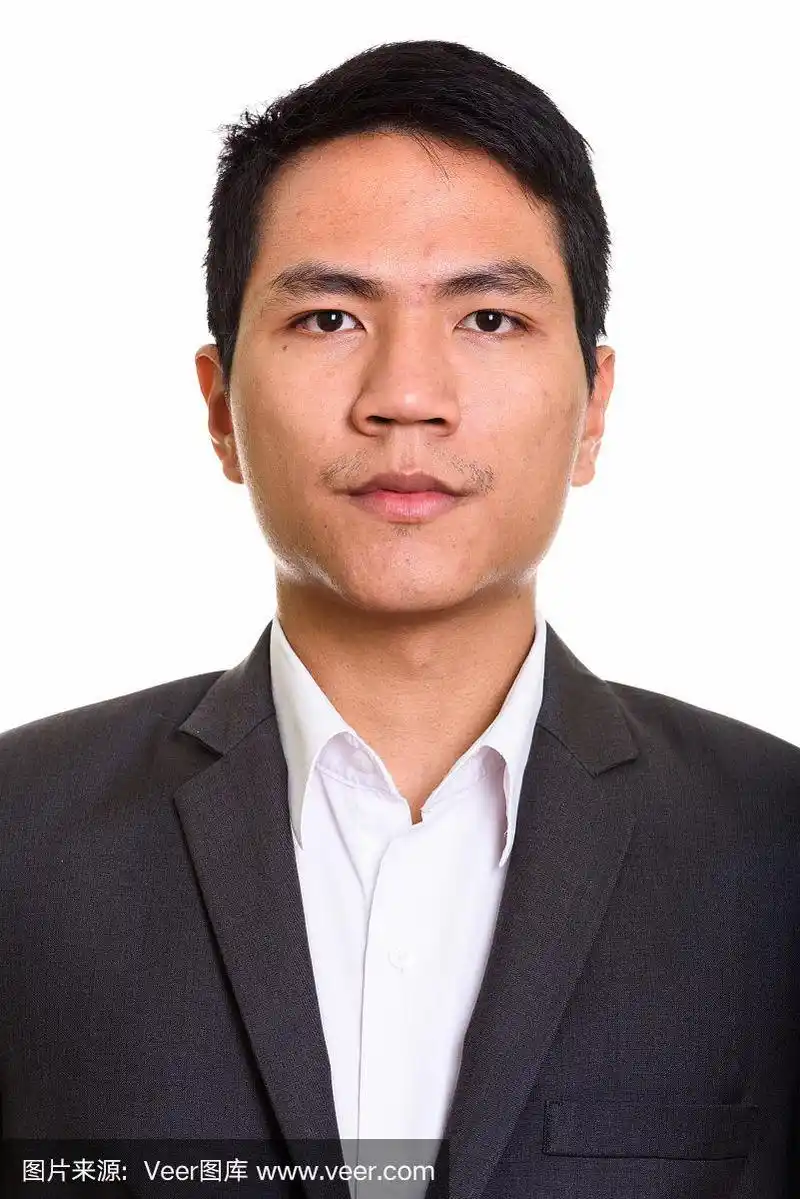 年轻的亚洲商人的面孔