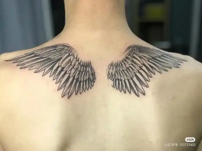 不知道还能不能再遇见只记得一个纹身一个背影