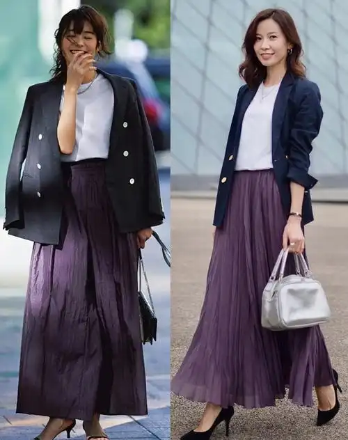 可以选择藏蓝色圆领毛衣搭配棕红色的不规则半裙或直筒裤,两种颜色