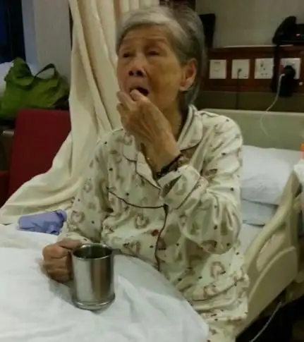 覃美金香港歌星梅艳芳母亲