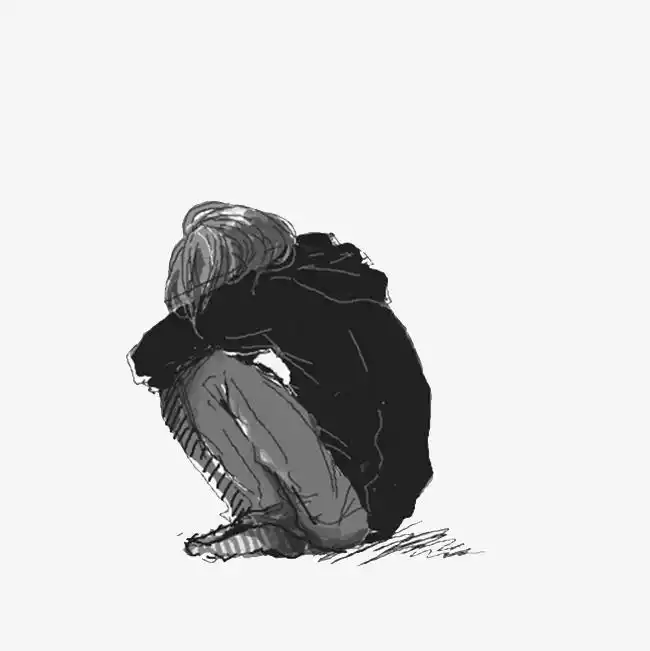 蜷缩蹲下孤独的侧影