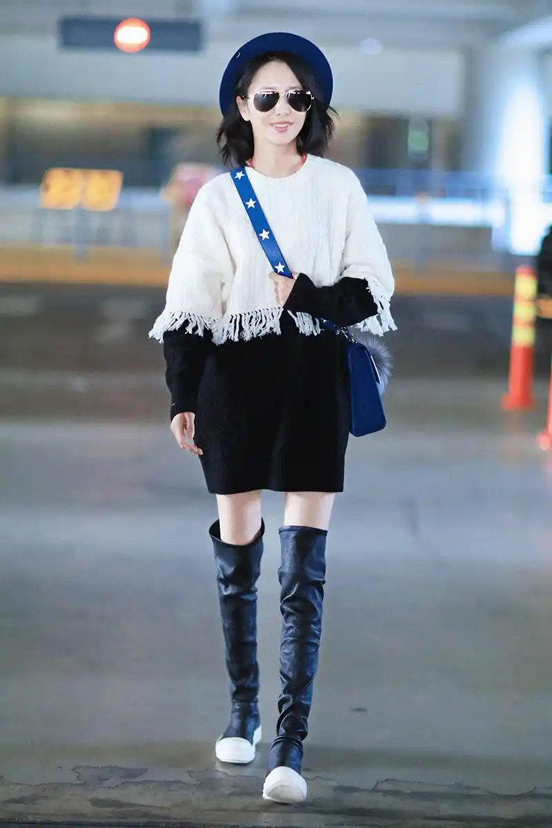 佟丽娅美得高调,穿毛衣配长靴走机场,实力演绎出优雅贵气