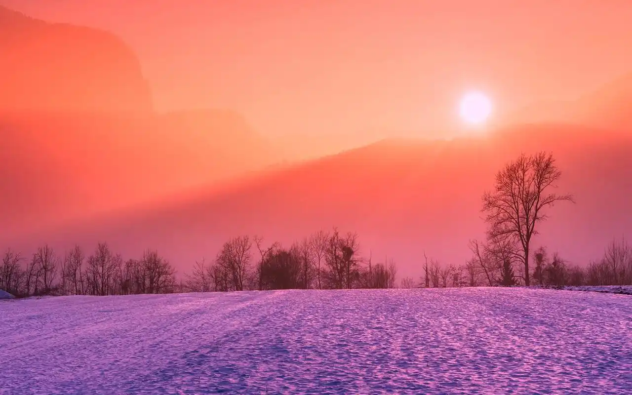 唯美日出风景图片电脑壁纸.日出时太阳光因为受到地球大气层灰尘的影