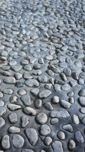 鹅卵石子路面纹理哈尔滨中央大街地面云台花园鹅卵石地面地面装饰石材